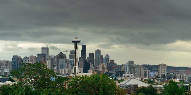 Seattle's Long Gray Winter shown with a cloudy backdrop to the Seattle skyline